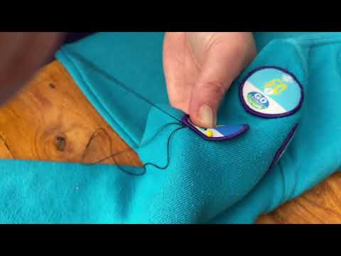 How to sew a badge onto your uniform.